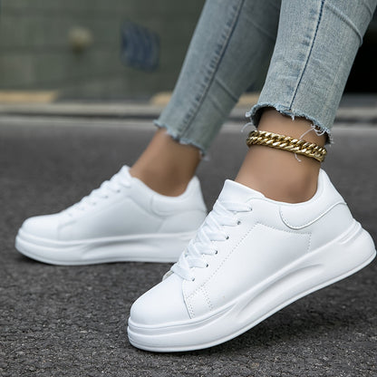 Romy - Baskets en cuir blanc avec un aspect épuré