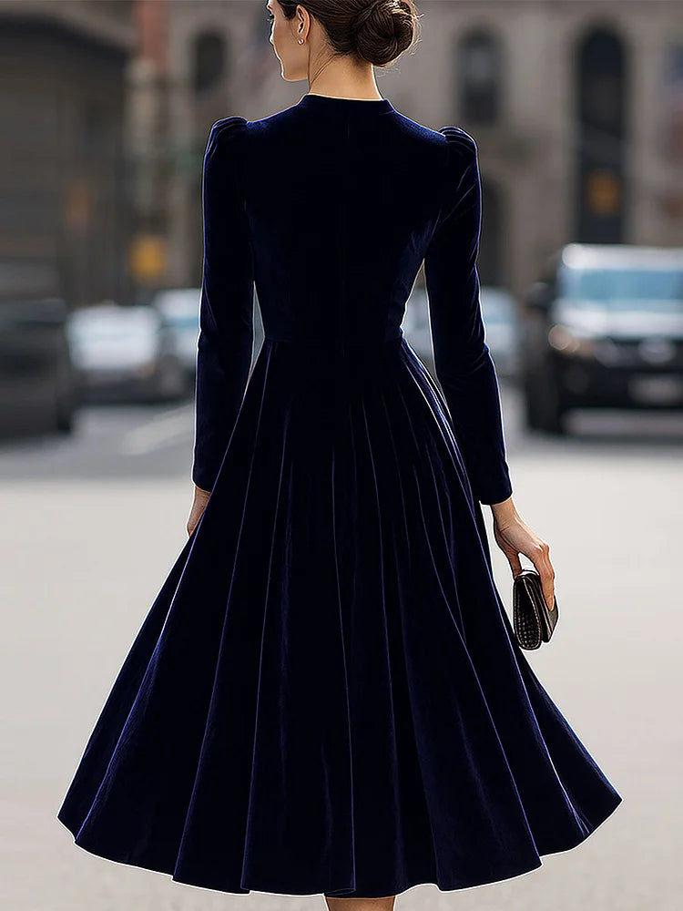 Robe midi en velours luxueux avec manches longues