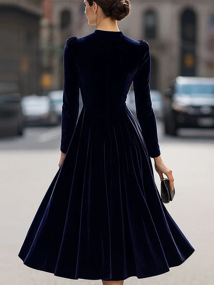 Robe midi en velours luxueux avec manches longues