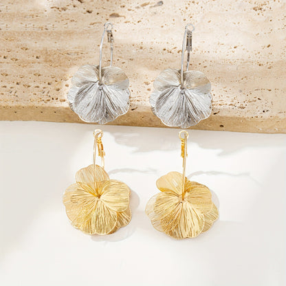 Boucles d'oreilles creuses en or exagérées