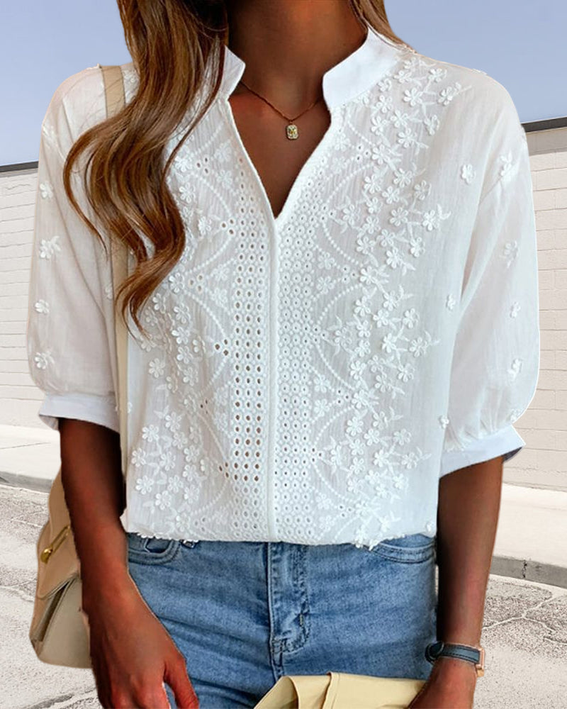 Blouse avec décolleté en V et manches bouffantes et dentelle