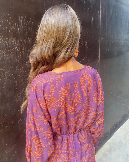 Grace – Robe midi élégante avec imprimé floral et nœud
