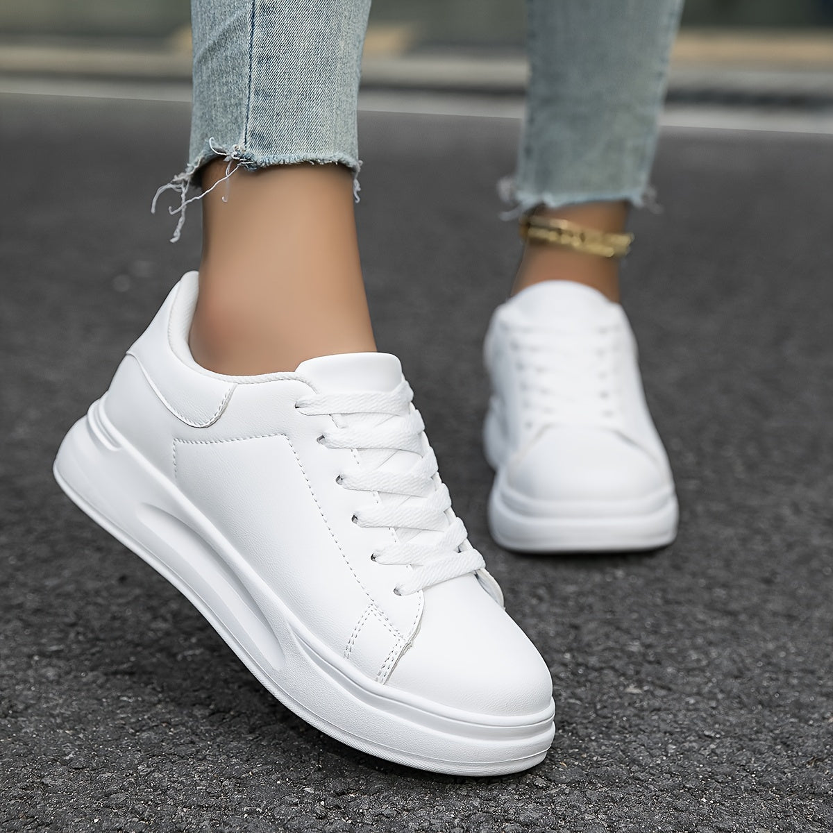 Romy - Baskets en cuir blanc avec un aspect épuré
