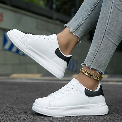 Romy - Baskets en cuir blanc avec un aspect épuré