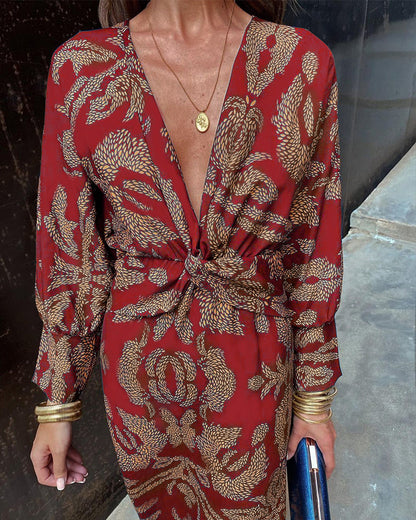 Grace – Robe midi élégante avec imprimé floral et nœud