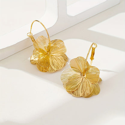 Boucles d'oreilles creuses en or exagérées