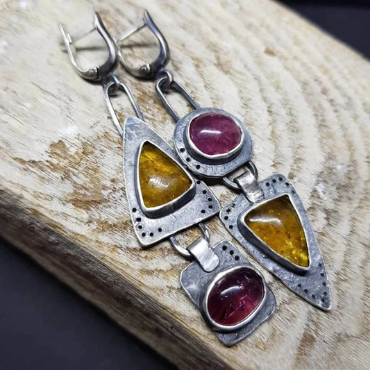 Boucles d'oreilles géométriques en triangle intemporel