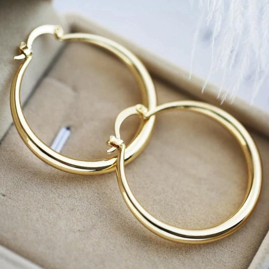 Boucles d'oreilles en or accrocheuses