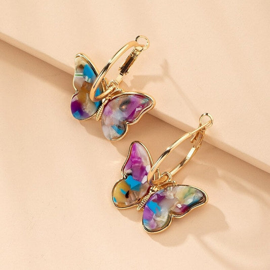 Boucles d'oreilles créoles en or multicolore en forme de papillon