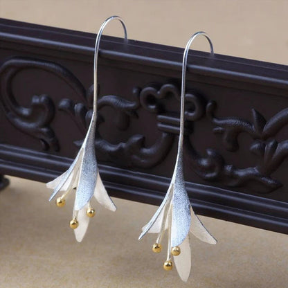 Boucles d'oreilles élégantes en argent avec fleurs