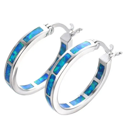 Boucles d'oreilles créoles en opale bleue chic