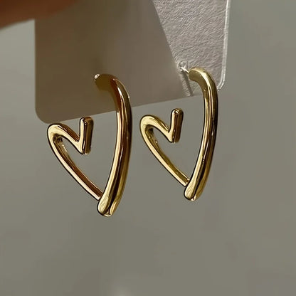 Boucles d'oreilles élégantes en or rose en forme de cœur