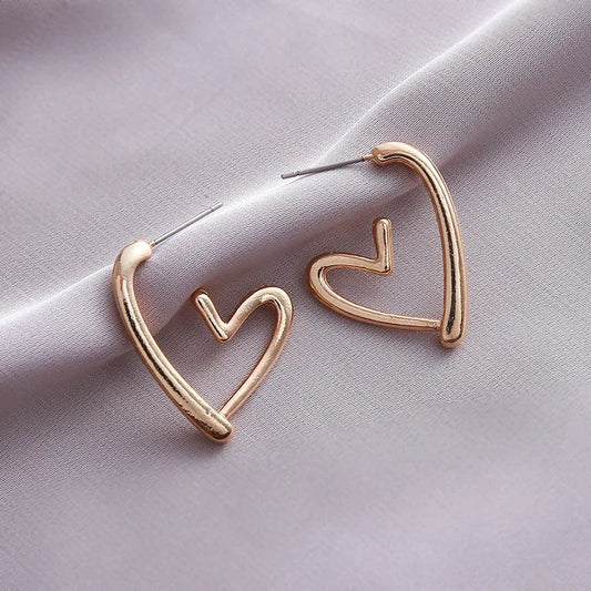 Boucles d'oreilles élégantes en or rose en forme de cœur
