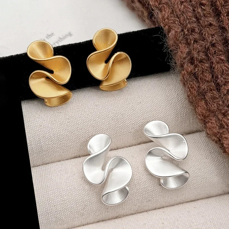 Boucles d'oreilles en argent sterling et or 18K en forme de fleur