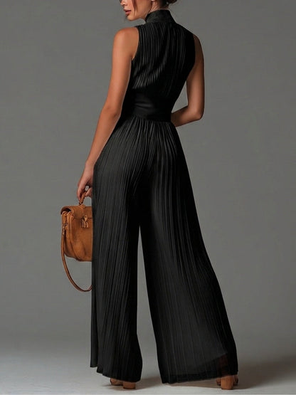 Combinaison sans manches à col en V noir avec fermeture éclair et plissée à jambes larges en chiffon