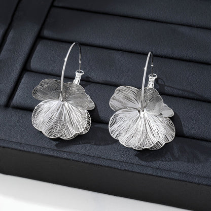 Boucles d'oreilles creuses en or exagérées