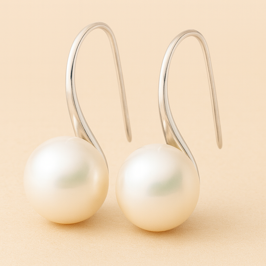Boucles d'oreilles pendantes élégantes avec perles