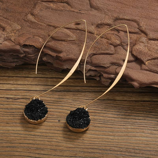 Boucles d'oreilles vintage noires et dorées pendantes